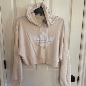Adidas Women’s Cropped hoodie. Cream color with white logo. Size XS.